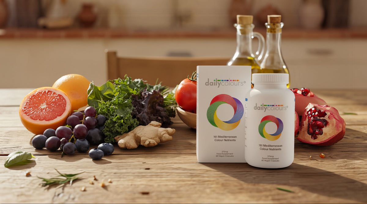 Bottle of Daily Colours supplements with Mediterranean vegetables and fruits behind them