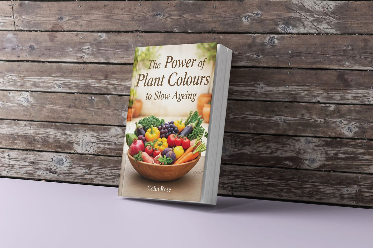 The Power of Plant Colours to Slow Aging book by Colin Rose shown standing leaning against a wooden wall